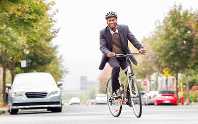 A man cycles to work
