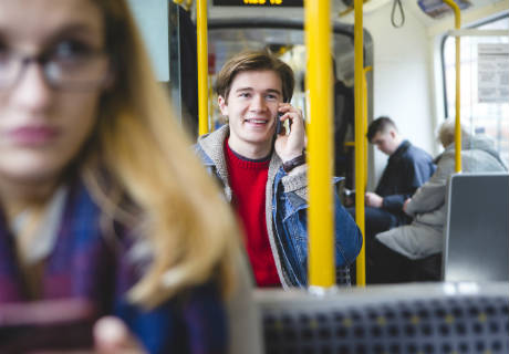 Young people taking a bus journey