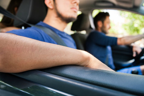 Friends sitting in the car ready to start vacations