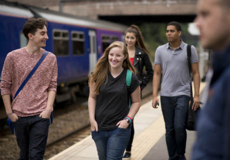 People on the platform at the train station