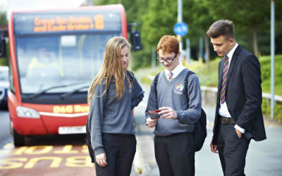 School children at a bus stop