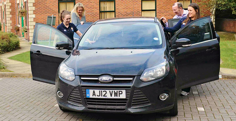 Four people sharing a car