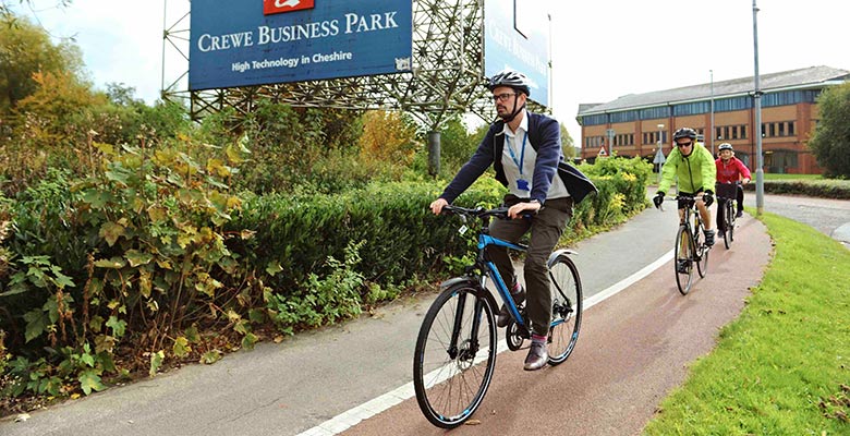 Cyclists passing Crewe Business Park